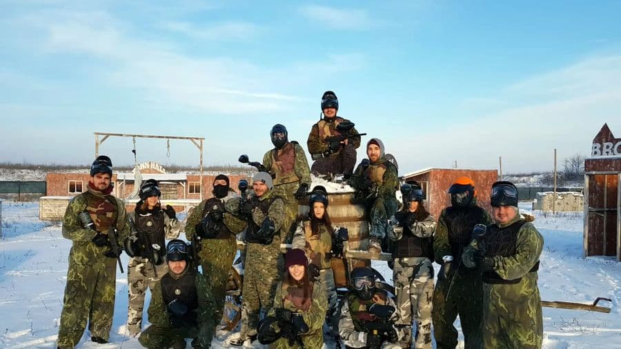 Group of players on the field in winter, Paintball Hunter